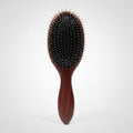 Front view of 7th Heaven luxury hair extensions brush with wooden handle and extension-safe bristles