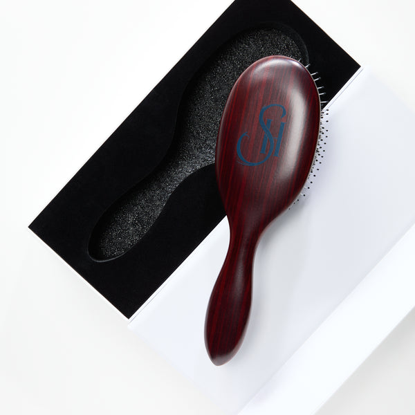 Detailed view of the anti-static bristles on the Beechwood Extension Brush, designed to protect and style Seventh Heaven hair extensions.