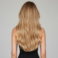 Back view of 16 inch Mystical Mixed Golden Blonde clip-in hair extensions showing natural blend and fullness