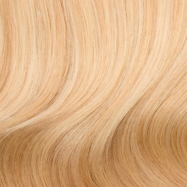 Close-up swatch of Mystical Mixed Golden Blonde clip-in hair extensions showing multi-dimensional golden blonde tones