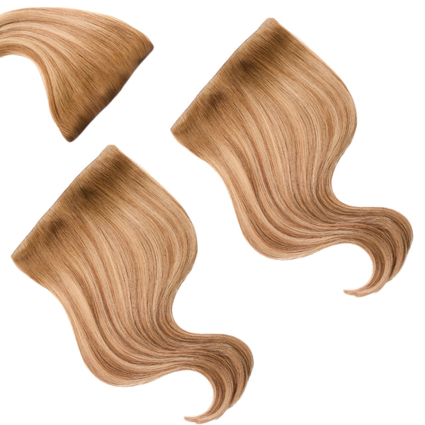 Seventh Heaven’s 20-inch Rooted Dark Sandy Bronde Mini Set clip-in hair extensions, offering effortless length, volume, and natural blending.