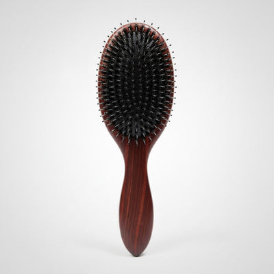 Front view of 7th Heaven luxury hair extensions brush with wooden handle and extension-safe bristles