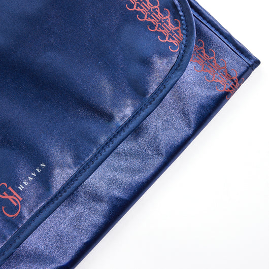 Close-up of the satin material used in the Trusty Tri-Fold Hair Extension Organizer for gentle extension care.