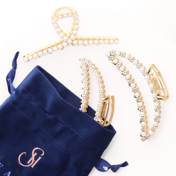 Seventh Heaven Celestial Claw Clip in Pearl, a luxurious hair accessory featuring a soft pearlescent finish for a classic, elegant style.