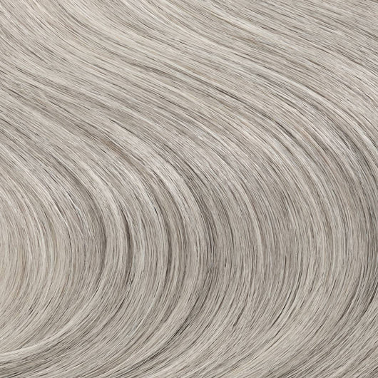 Close-up swatch of icy salt and pepper shade from 7th Heaven clip-in hair extensions