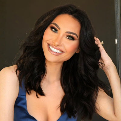 12 inch Midnight Mystique black clip in hair extensions with soft waves and natural shoulder length volume