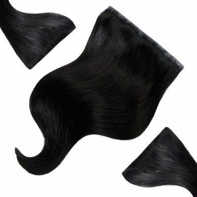 16 inch Midnight Mystique black clip in hair extensions mini set showing smooth, glossy texture and natural wave pattern