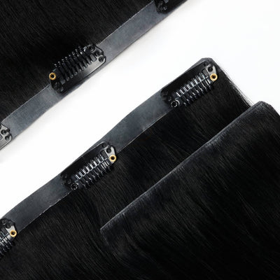 Close up of seamless band on Midnight Mystique black clip in hair extensions for comfortable, secure wear