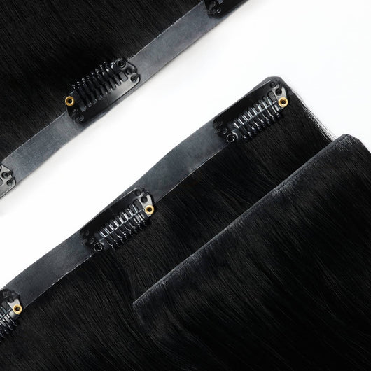 Close up of seamless band on Midnight Mystique black clip in hair extensions for comfortable, secure wear