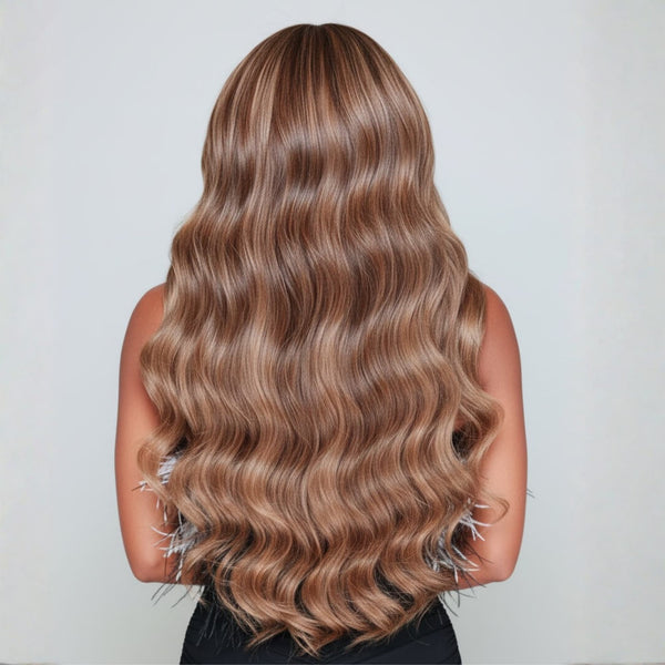 Back view of 20 inch rooted dark sandy bronde clip-in hair extensions showing length and blend