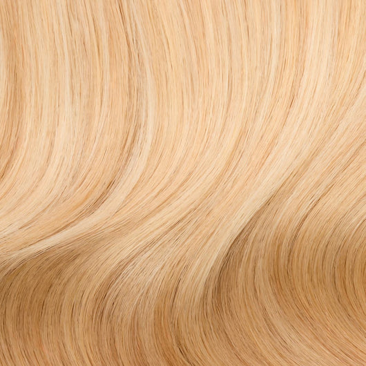 Close-up swatch of Mystical Mixed Golden Blonde clip-in hair extensions showing multi-dimensional golden blonde tones
