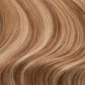 Close-up swatch of rooted dark sandy bronde shade from 7th Heaven clip-in hair extensions