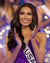 Miss USA 2023 Noelia Voigt at the Miss Universe pageant showcasing her Golden Chocolate Brown Hair Extensions from Seventh heaven. 