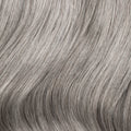 Close-up view of Sacred Salt &Pepper clip-in hair extensions from Seventh Heaven, showcasing silky, full cuticle strands with premium gray and silver tones.